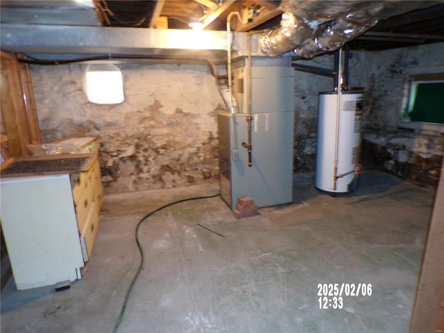 basement featuring heating unit and water heater