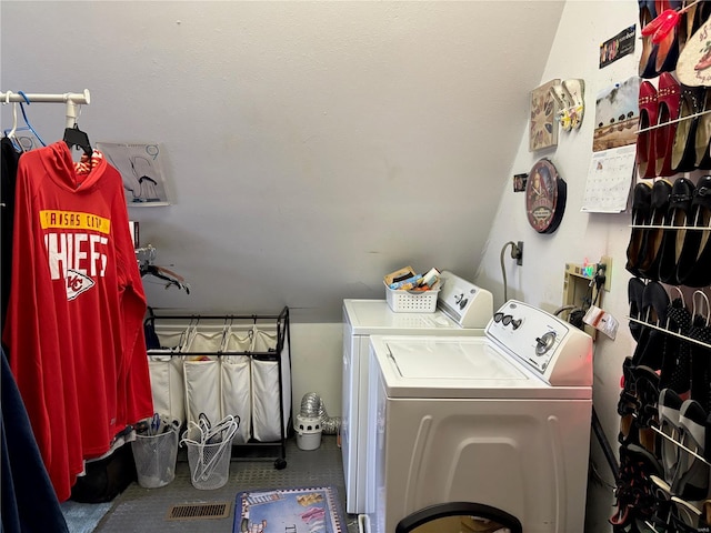 washroom featuring washer and dryer