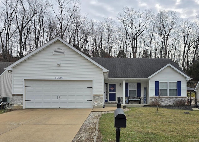 single story home featuring a garage, a front yard, and central AC unit