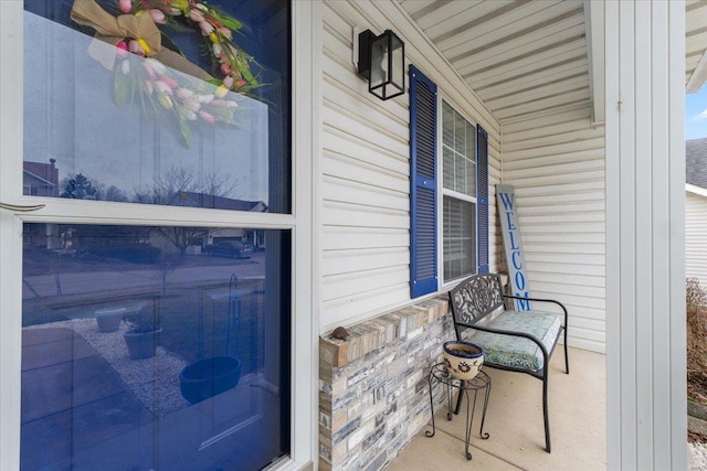 doorway to property with a porch