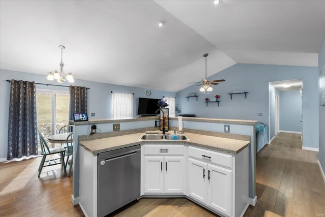 kitchen featuring a sink, light wood finished floors, stainless steel dishwasher, and ceiling fan with notable chandelier