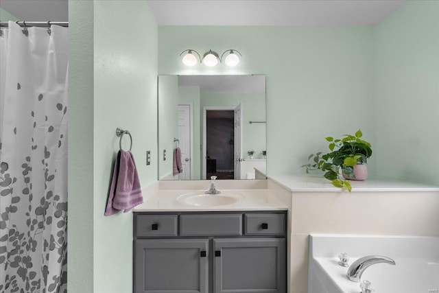 bathroom featuring a garden tub, vanity, and a shower with curtain