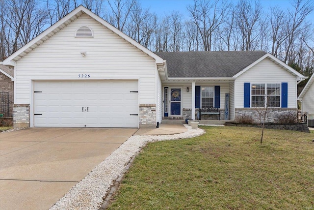 single story home featuring a garage, a front yard, concrete driveway, and brick siding