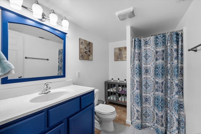 full bathroom with curtained shower, tile patterned flooring, toilet, visible vents, and vanity