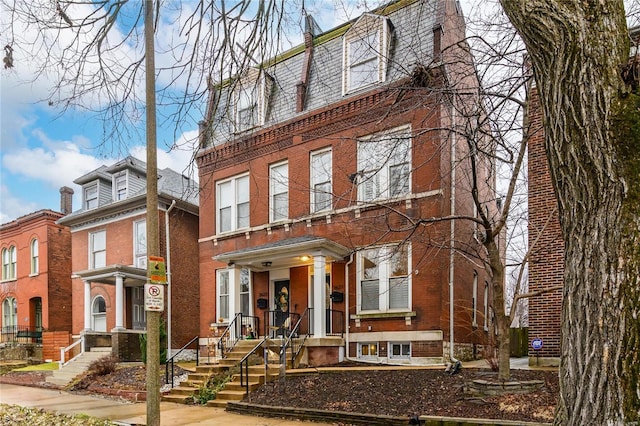 view of front of property featuring brick siding