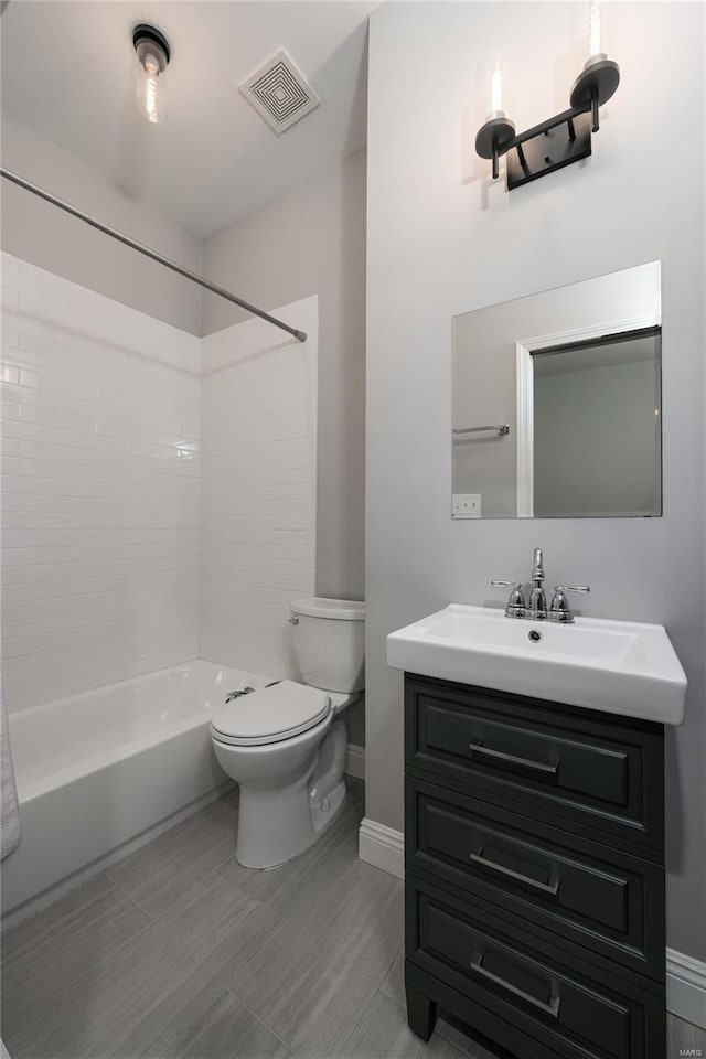 full bathroom featuring vanity, toilet, and shower / bath combination