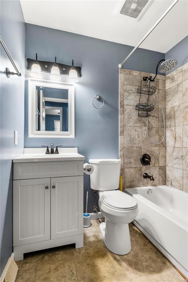 full bathroom with bathing tub / shower combination, visible vents, toilet, vanity, and tile patterned floors