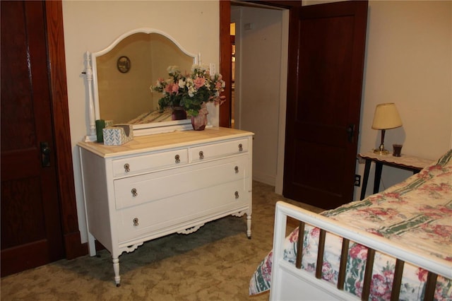 bedroom featuring carpet