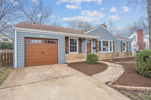 single story home featuring a garage