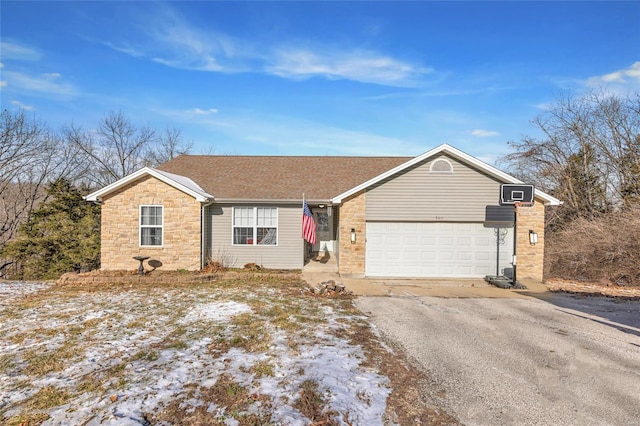 single story home with a garage