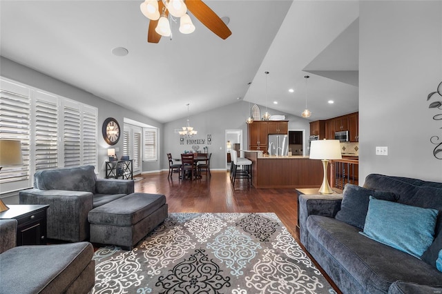 living area with baseboards, dark wood-type flooring, ceiling fan with notable chandelier, vaulted ceiling, and recessed lighting