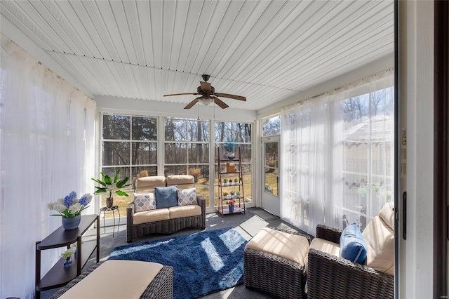 sunroom / solarium with ceiling fan