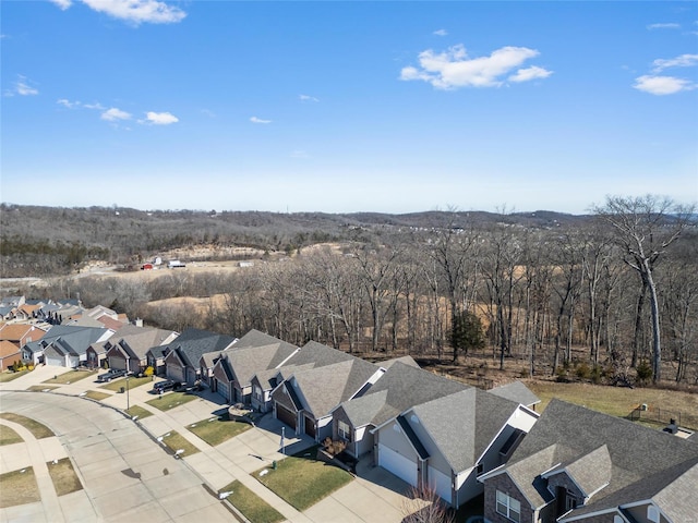 birds eye view of property with a residential view