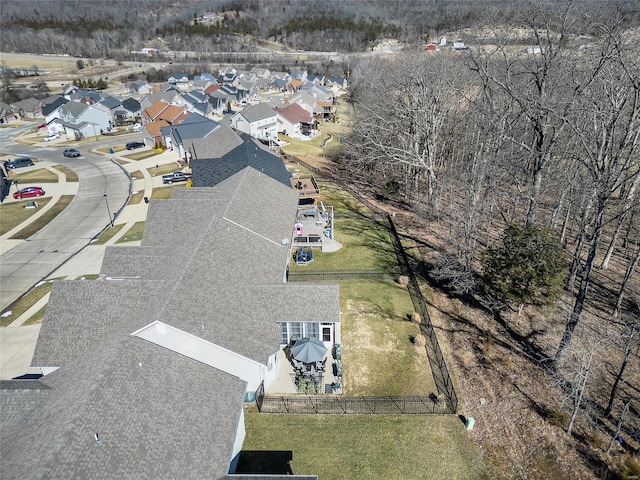 birds eye view of property with a residential view