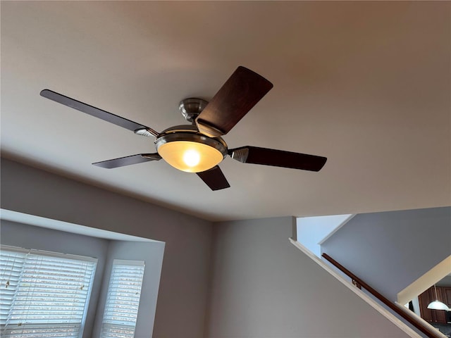 interior details featuring ceiling fan