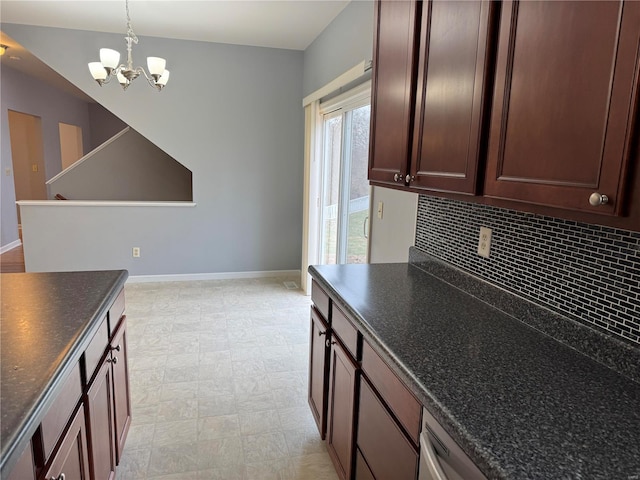 kitchen featuring hanging light fixtures, dark brown cabinets, backsplash, and a chandelier