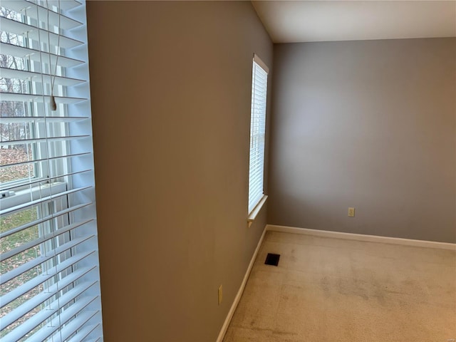 view of carpeted spare room