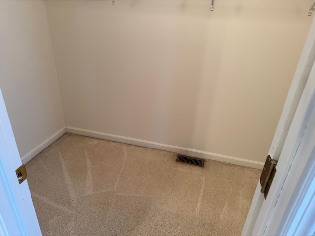 unfurnished room featuring carpet flooring