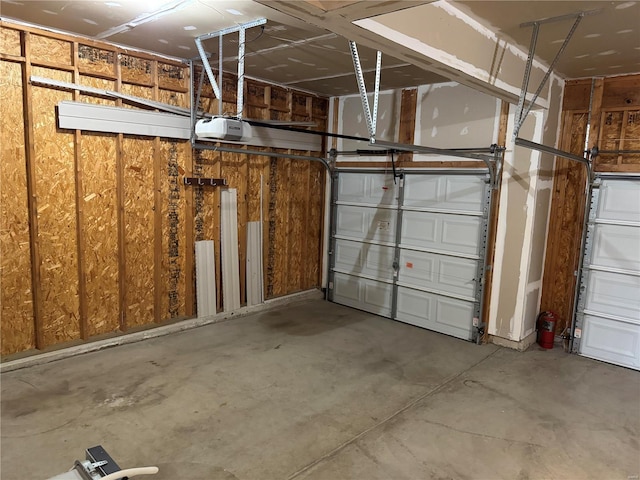 garage featuring a garage door opener