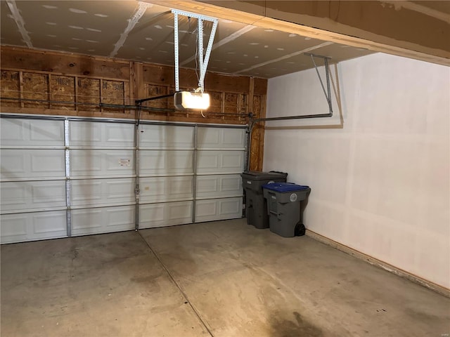 garage featuring a garage door opener