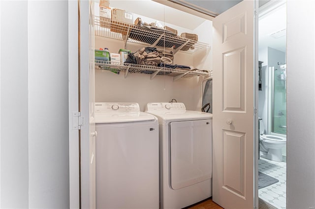 laundry area with washer and dryer and laundry area