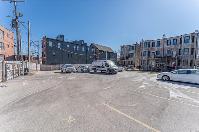 uncovered parking lot with fence