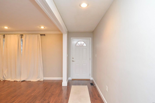 foyer with dark hardwood / wood-style floors