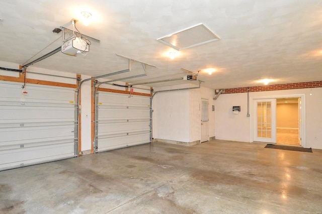 garage featuring a garage door opener