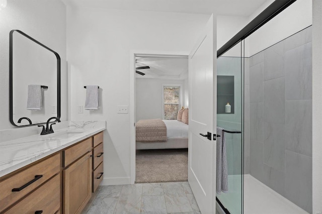 bathroom with vanity and walk in shower