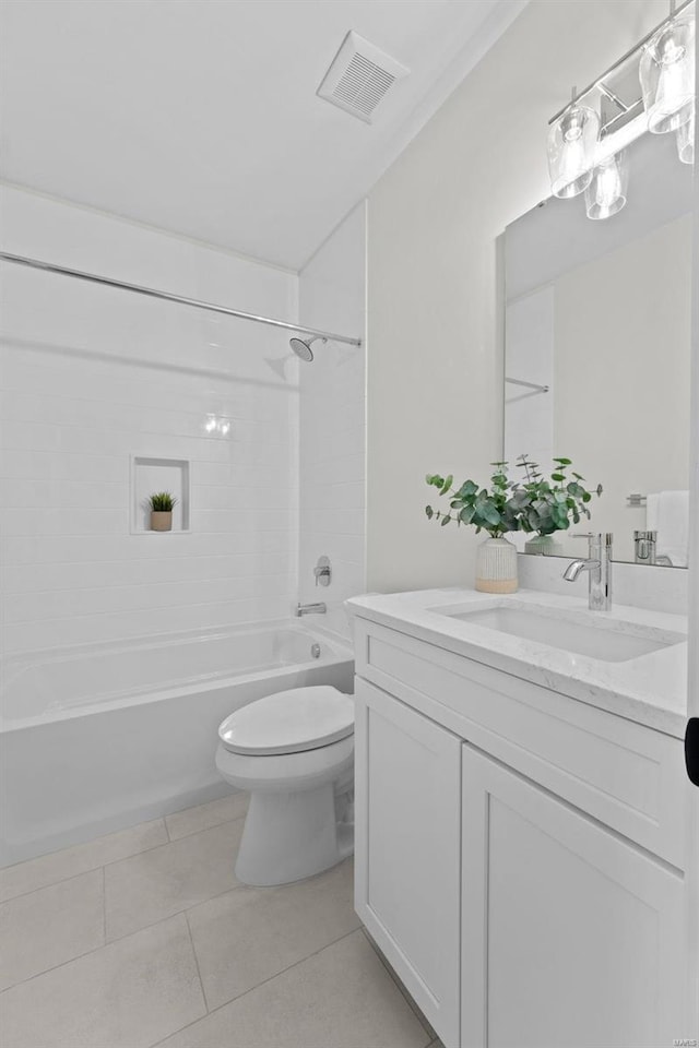 bathroom featuring toilet, bathing tub / shower combination, vanity, visible vents, and tile patterned floors