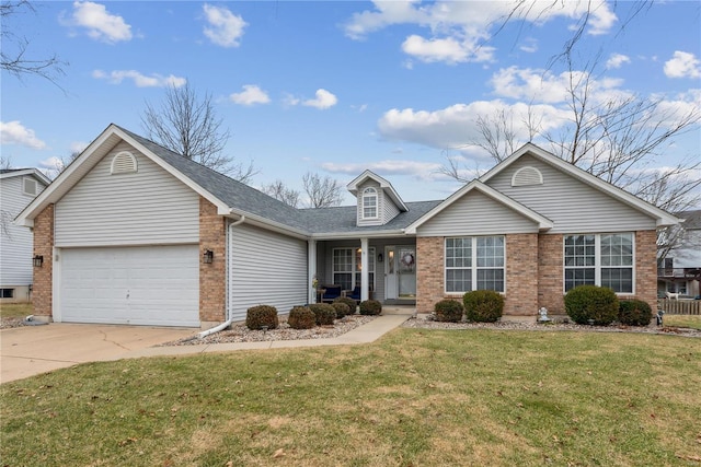 view of front of property with a garage, a front yard, and a porch