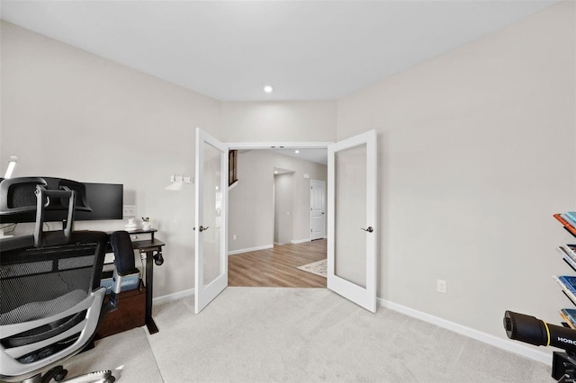 carpeted home office featuring recessed lighting, french doors, and baseboards