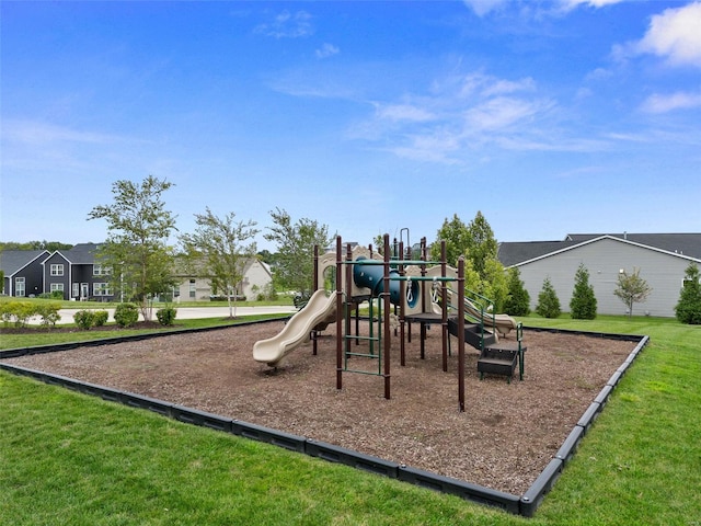 community play area featuring a lawn