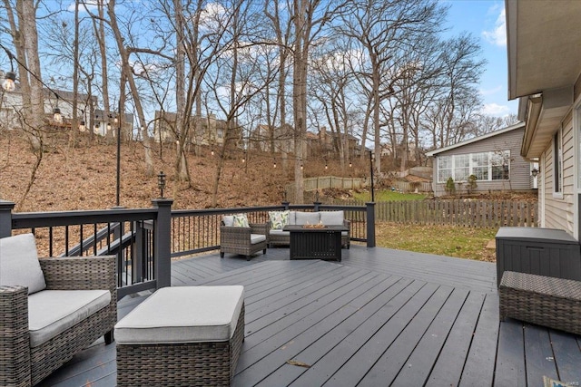 wooden terrace with outdoor lounge area