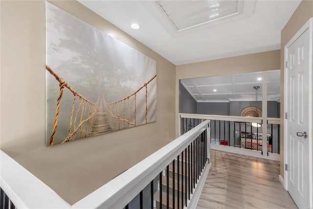 hallway with recessed lighting and wood finished floors