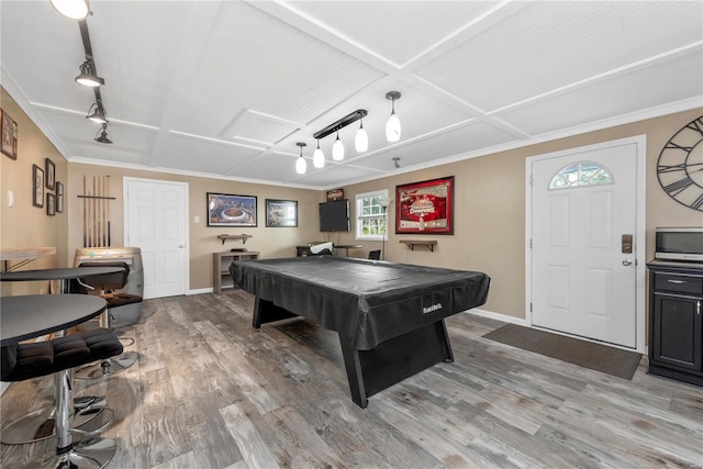 recreation room with billiards, baseboards, light wood finished floors, rail lighting, and crown molding
