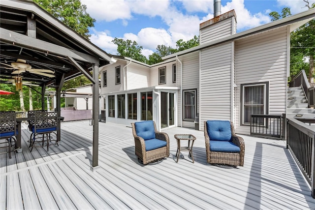 wooden terrace with a sunroom