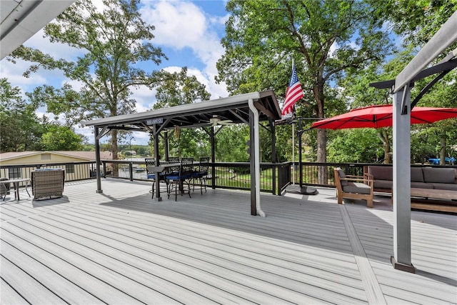 wooden deck featuring an outdoor living space and outdoor dining space