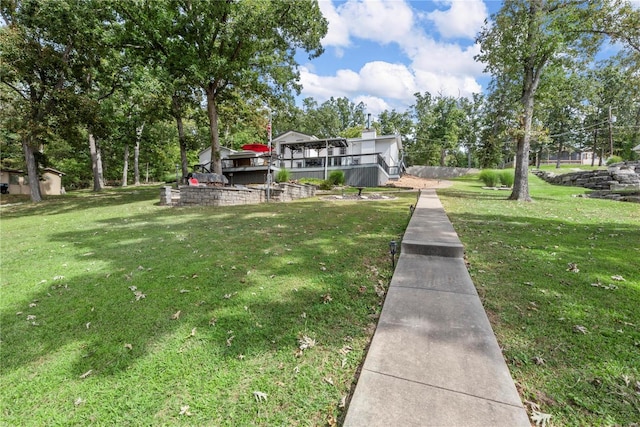 view of yard featuring a deck