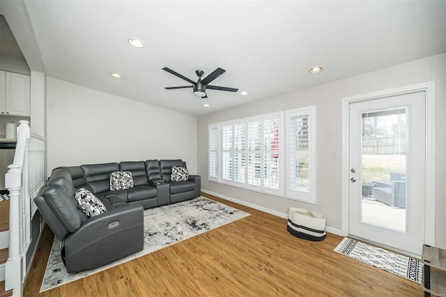 living room featuring recessed lighting, wood finished floors, baseboards, and ceiling fan