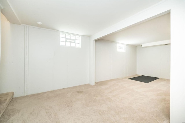 below grade area featuring carpet flooring