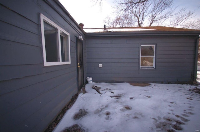 view of snow covered property