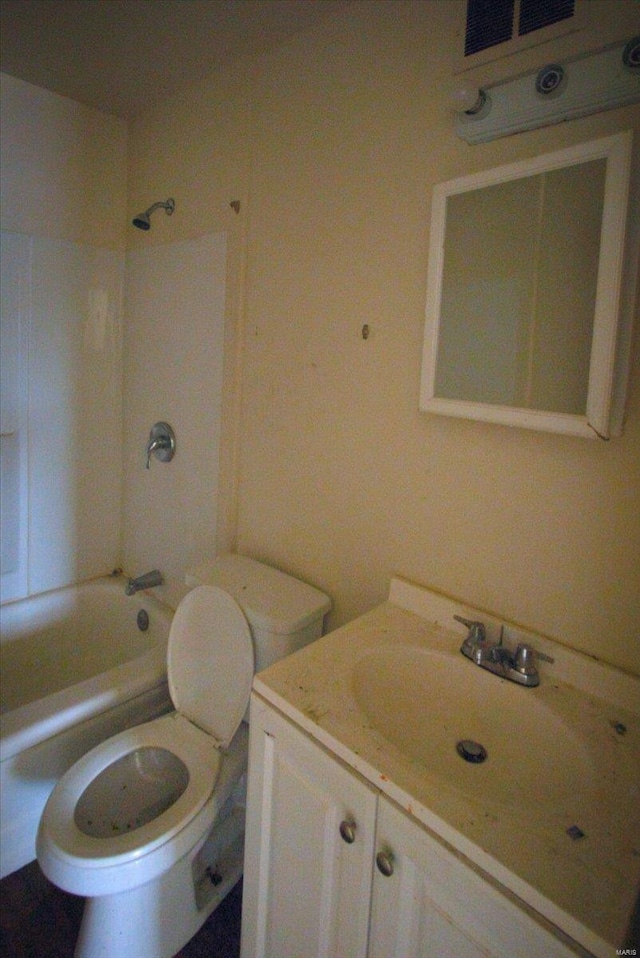 full bathroom with vanity, tub / shower combination, and toilet