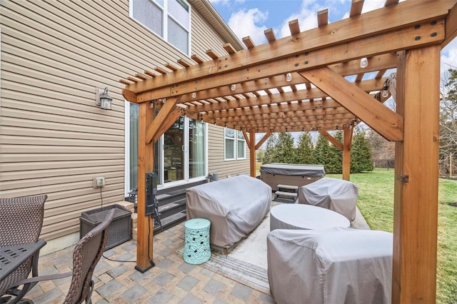 view of patio / terrace featuring area for grilling, a pergola, and a hot tub