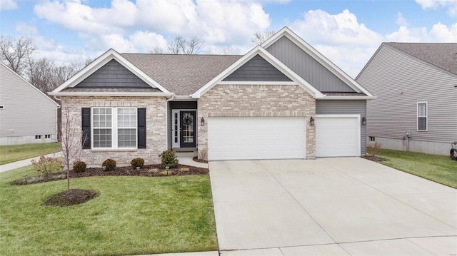 view of front of house featuring a garage and a front yard