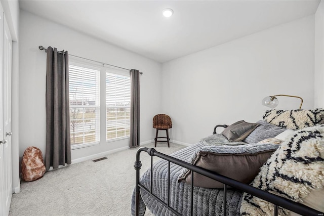 bedroom featuring carpet