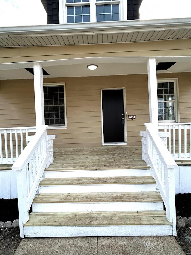 property entrance with a porch