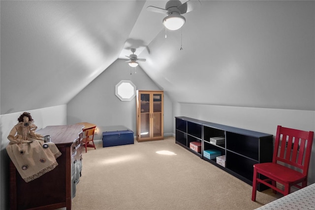 bedroom featuring carpet floors, vaulted ceiling, and a ceiling fan