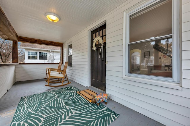 doorway to property featuring a porch