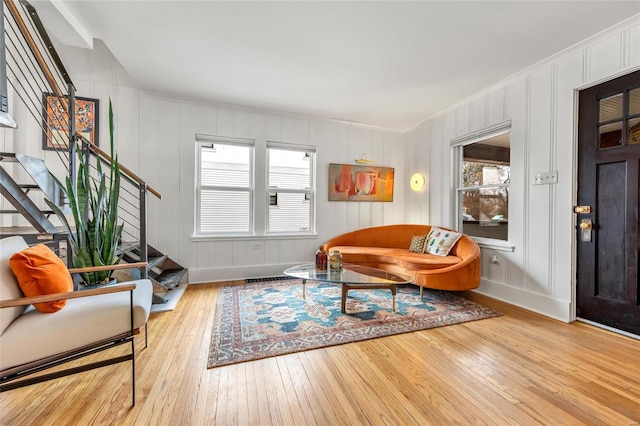 living area with light hardwood / wood-style flooring